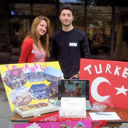 student displaying cultural items