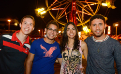  4 students at carnival during aztec nights 