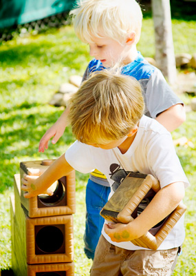 kids playing with giant blocks