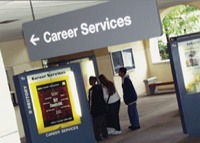 Career services sign and students