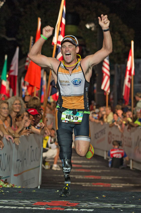 Eric Mcelvenny crossing the finish line