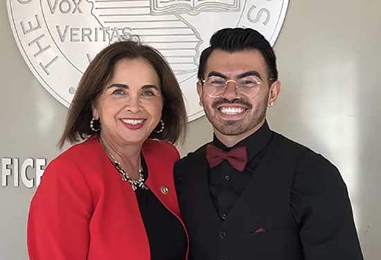 Manuel Gonzales IV with SDSU President Adela de la Torre