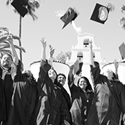 graduation students tossing caps