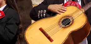 mariachi player with guitar 