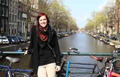 a student poses in Amsterdam