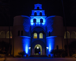 Hepner Hall lit up at night with blue light