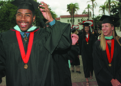 students in graduation cap and gown