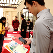 student on cell phone jobhunting